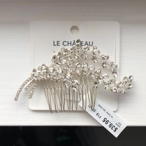 Silver coloured with faux diamonds hair comb
